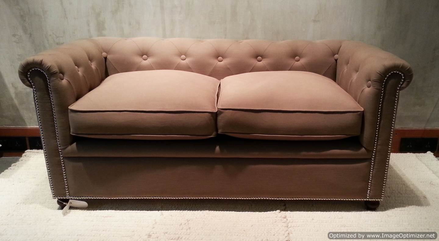 Brown Sofa with Bolts